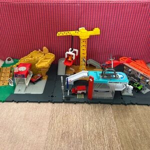 Lot of 4 Matchbox Action Drivers Playsets (complete with vehicles)